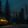 A yellow camper van with lights on is parked in a forest clearing at night, surrounded by tall pine trees under a starry sky. Camping-themed print available in A1 to A4 sizes.