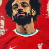 Illustrated portrait of Mohamed Salah, a male football player wearing a red Liverpool FC jersey with the club logo and Nike symbol, set against a striking red background. Wall art print available in A1 to A4 sizes.