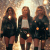 Three women in black outfits stand confidently in a forest setting, surrounded by bright, glowing lights and sparkles. Cinematic-style teen attitude poster available in A1 to A4 sizes.