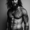 An art portrait of Jason Momoa, with long hair, a beard, and tribal tattoos on his arms and chest stands shirtless, wearing a necklace and wristbands, against a plain background. Wall art print available in A1 to A4 sizes.