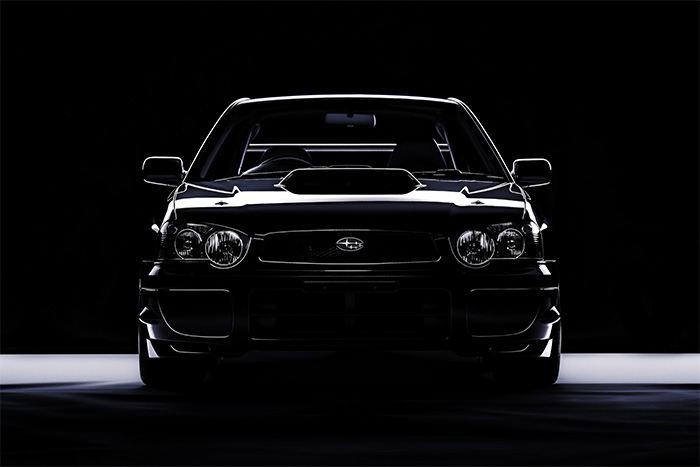 product-image-3-2 Front view of a black Subaru Impreza with prominent headlights and hood scoop, set against a dark background with dramatic lighting. Wall art print available in A1 to A4 sizes.