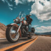 A motorcyclist rides a large cruiser bike on a two-lane road through a scenic, mountainous landscape under a partly cloudy sky. Wall art print available in A1 to A4 sizes.