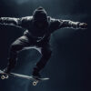 A person in a hoodie and pants performs a skateboard trick mid-air against a dark background. Wall art print available in A1 to A4 sizes.