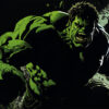 Illustration of a muscular green humanoid figure, the Hulk, in a dynamic pose with clenched fists, appearing to leap forward amid debris and a dark background. Fantasy art poster available in A1 to A4 sizes.