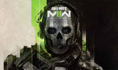 A poster features a soldier wearing a skull mask and headset in the promotional art for Call of Duty: Modern Warfare II, with striking green and black accents in the background. Gaming poster available in A1 to A4 sizes.