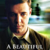 A man in a suit looks down thoughtfully with a blurred background; text on the image reads “A Beautiful Mind,” referencing the acclaimed 2001 movie. Movie poster print available in A1 to A4 sizes.