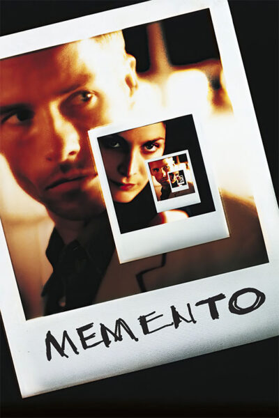 A close-up Polaroid photo of a serious man from the 2000 movie Memento, with a smaller photo of a woman inside it, and the word MEMENTO handwritten at the bottom. Movie poster print available in A1 to A4 sizes.