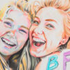 Colored pencil drawing of two smiling girls close together, with the letters BFF in colourful text at the bottom right. Colored pencils are visible on the edges of the artwork. Wall art print available in A1 to A4 sizes.