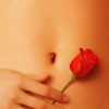 A close-up of a hand holding a red rose against bare skin, evoking the iconic imagery from the 1999 movie American Beauty, with the text AMERICAN BEAUTY at the top. Movie poster print available in A1 to A4 sizes.