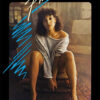 Woman sitting on a couch wearing an off-the-shoulder sweater and red heels, with the word Flashdance written above in stylized text—a nod to the iconic 1983 movie. Movie poster print available in A1 to A4 sizes.