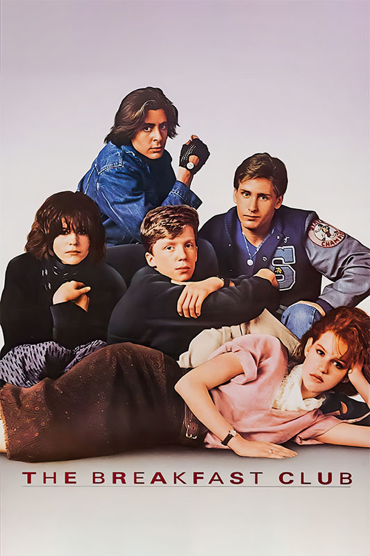 product-image_0005_The Breakfast Club.jpg Five teenagers sit closely together against a plain background, with The Breakfast Club—John Hughes’ iconic 1985 movie—written at the bottom in bold red text. Movie poster print available in A1 to A4 sizes.