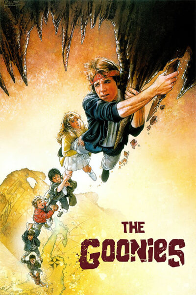 Illustrated movie poster for the adventure film The Goonies shows a group of kids hanging onto each other in a chain, dangling from rocks inside a cave. Movie poster print available in A1 to A4 sizes.