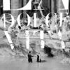 A man in a suit and a woman in a dress stand in the Trevi Fountain; large white text reads La Dolce Vita, with credits for Federico Fellini, director of the iconic 1960 film, above. Movie poster print available in A1 to A4 sizes.