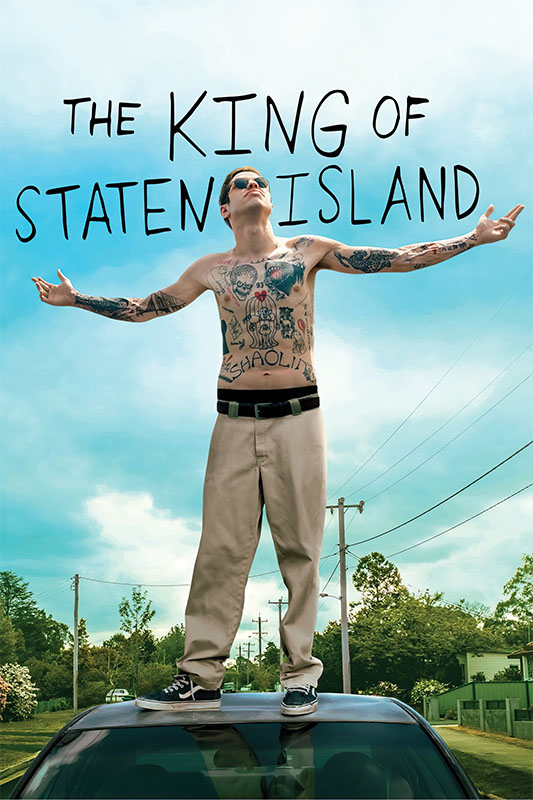 Product-Image_0002_The King of Staten Island.jpg A tattooed man in sunglasses stands on a car roof with arms outstretched under the title The King of Staten Island, the 2020 movie. Trees and power lines are visible in the background. Movie poster print available in A1 to A4 sizes.
