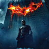 Poster for The Dark Knight (2008) showing Batman standing in front of a burning building with a flaming bat symbol above. Movie poster print available in A1 to A4 sizes.