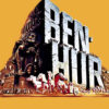 Movie poster for the 1959 movie Ben-Hur featuring large stone text, a chariot race scene with horses, and ancient statues against a yellow background—capturing the epic spirit of this classic film. Movie poster print available in A1 to A4 sizes.