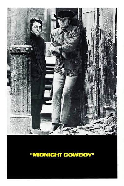 Two men stand on a city sidewalk next to a pillar and a pile of rubble; one wears a cowboy hat and fringed jacket. The text below reads MIDNIGHT COWBOY, referencing the acclaimed 1969 film that won the Academy Award for Best Picture. Movie poster print available in A1 to A4 sizes.
