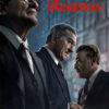 Three older men in suits stand together against a city backdrop, with the title The Irishman (2019) in bold red letters above them. Movie poster print available in A1 to A4 sizes.