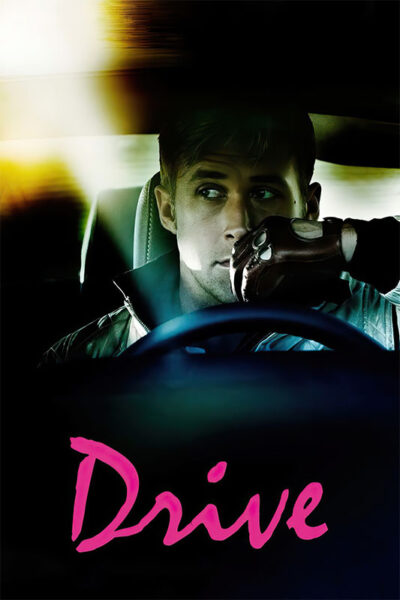 A man with driving gloves sits behind the wheel of a car, looking to his left, with the word Drive in pink script at the bottom—an iconic shot from the 2011 movie. Movie poster print available in A1 to A4 sizes.