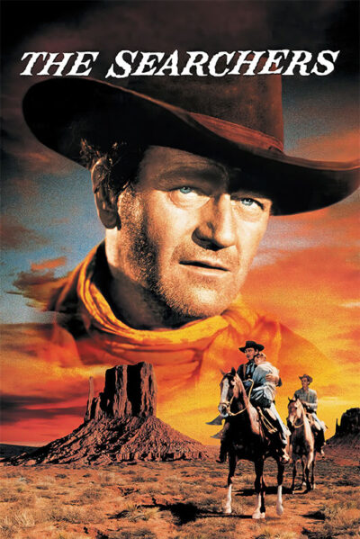 Movie poster for The Searchers (1956) featuring a large portrait of a cowboy in a hat, with two men on horseback riding across a desert landscape at sunset. Movie poster print available in A1 to A4 sizes.