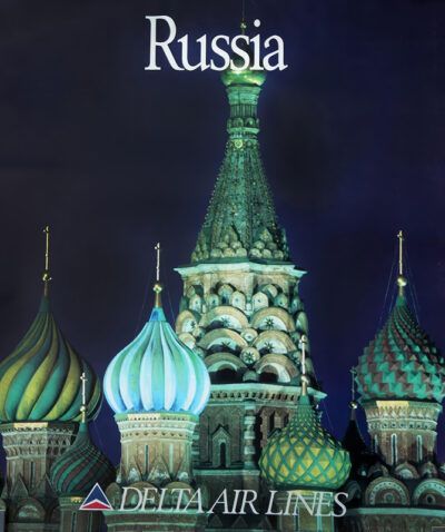 Nighttime view of Saint Basil’s Cathedral domes in Moscow, with the word Russia above and DELTA AIR LINES logo below, capturing the allure of Russia travel in this striking 1990 poster. Poster print available in A1 to A4 sizes.