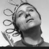 Black and white image of a woman with a crown of rope, looking upward with a tearful expression. The text reads The Passion of Joan of Arc, echoing the emotion of the iconic 1928 film. Movie poster print available in A1 to A4 sizes.