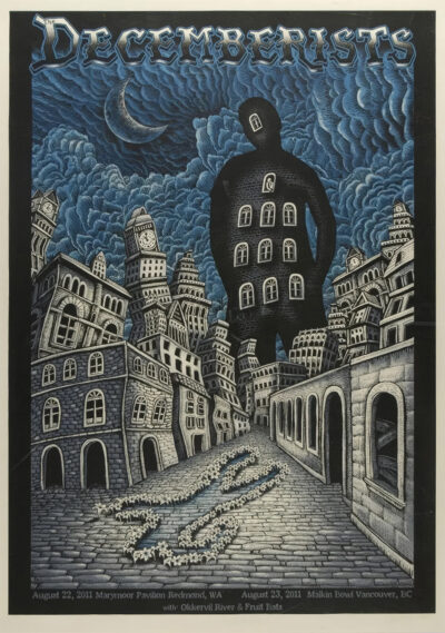 Concert poster for The Decemberists in Redmond WA, featuring a surreal cityscape with tilted buildings, a crescent moon, and a large shadowy figure with windows and doors on its body. Poster prints available in A1 to A4 sizes.
