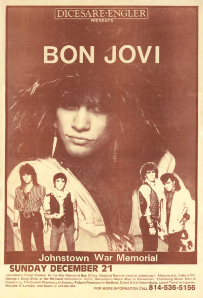 Sepia-toned concert poster for Bon Jovi at the Johnstown War Memorial, featuring a large band photo and event details for the December 21 show. Poster prints available in A1 to A4 sizes.
