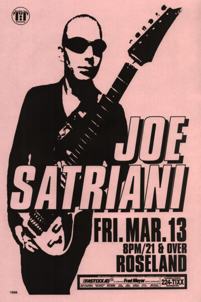 Black and white 1998 concert poster of Joe Satriani holding a guitar, advertising his Roseland concert on Friday, March 13 at 8 pm for ages 21 and over. Poster prints available in A1 to A4 sizes.