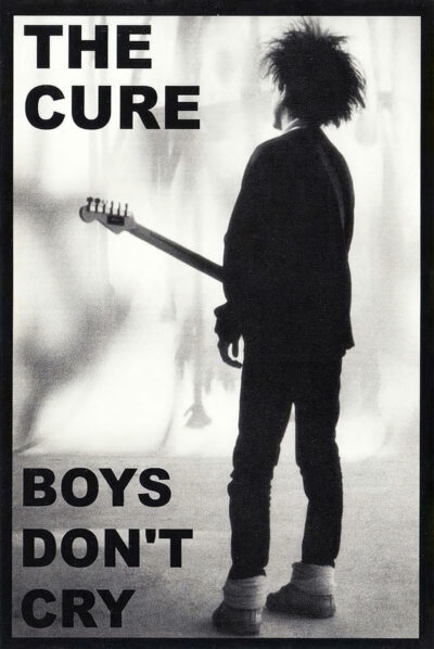Black-and-white photo of a person with a guitar standing in profile, with bold text The Cure Boys Dont Cry—a striking music poster celebrating the iconic band and their classic hit. A1 to A4 poster print.