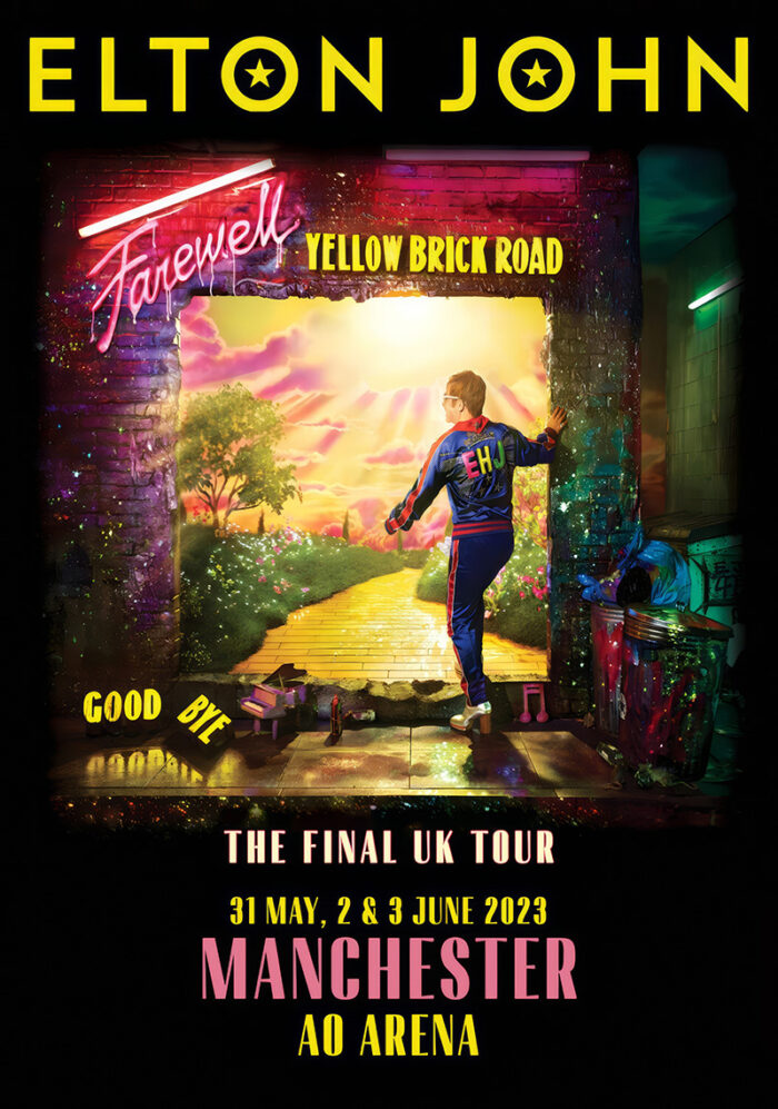 product-image Elton John stands in a doorway labeled Farewell Yellow Brick Road, wearing an EJ tracksuit, promoting his Manchester 2023 final UK tour dates. Poster print available in A1 to A4 sizes.